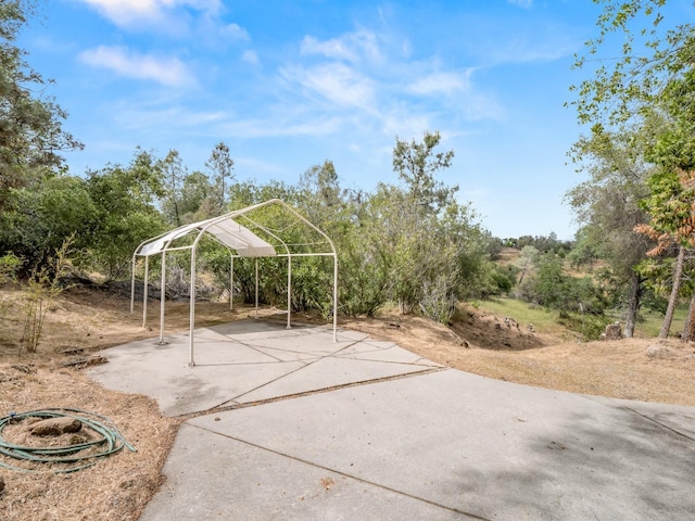 exterior space with a carport