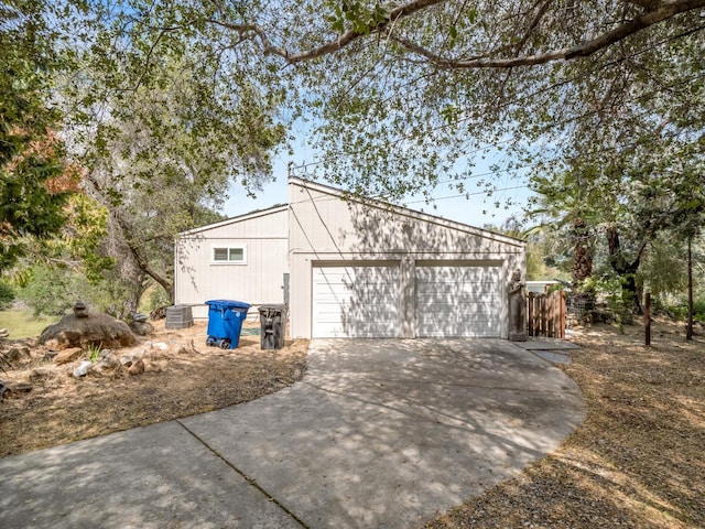 view of side of property with driveway