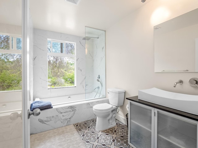 bathroom with vanity, a combined bath / shower with marble appearance, toilet, and visible vents