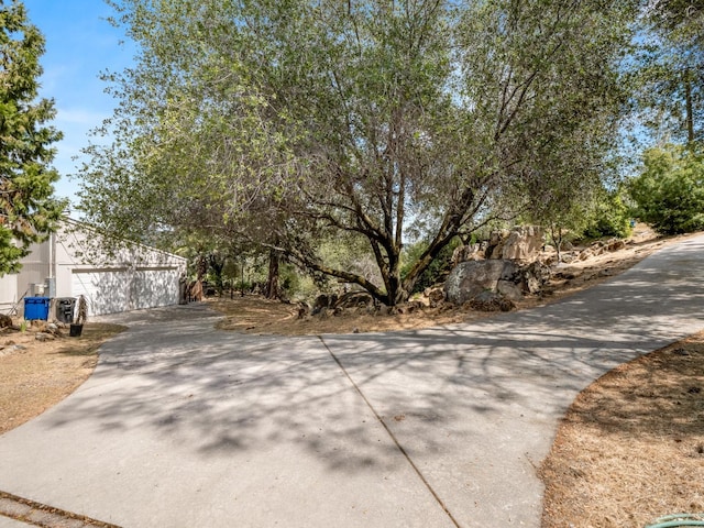 view of road featuring driveway