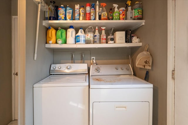 washroom with laundry area and washer and clothes dryer