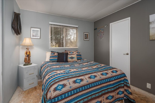bedroom featuring wood finished floors