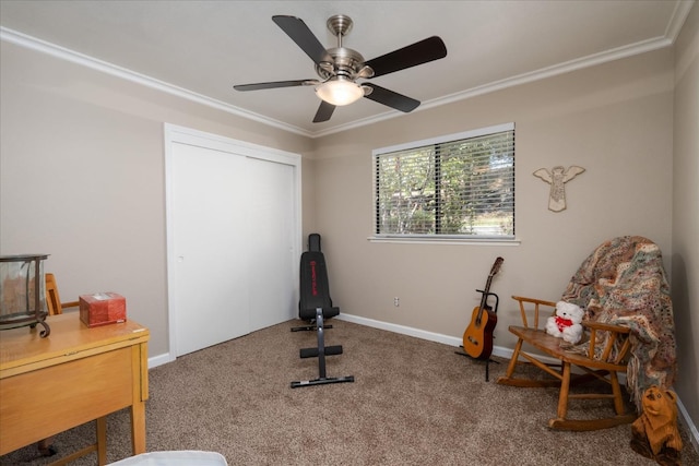 workout room with crown molding, carpet flooring, baseboards, and a ceiling fan