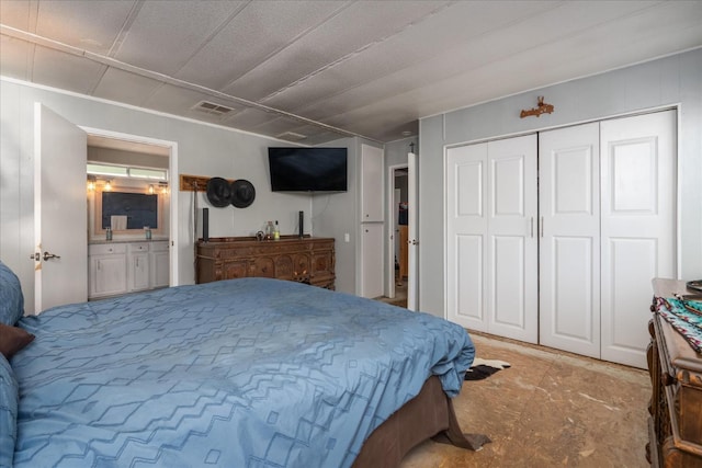 bedroom with visible vents and a closet