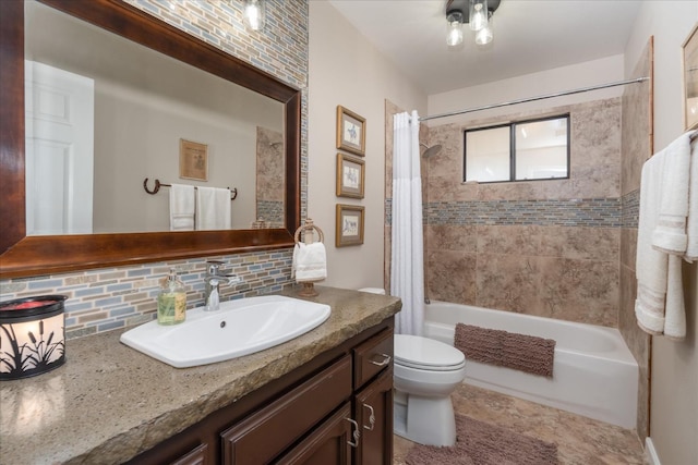 bathroom featuring vanity, backsplash, shower / bath combination with curtain, and toilet