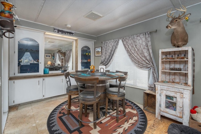 dining space with visible vents
