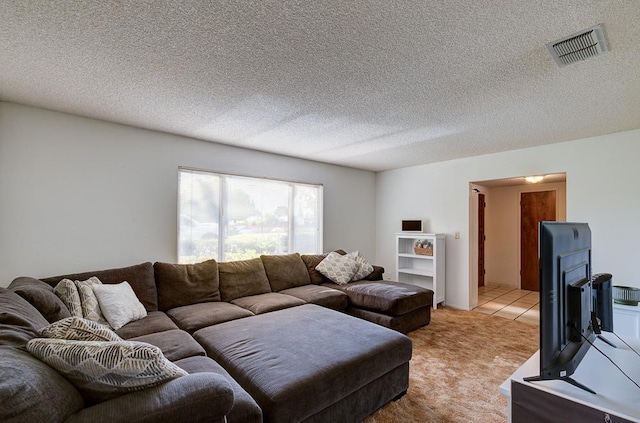 827 N Armstrong Ave, Clovis, CA 93611 - living room featuring light colored carpet and a textured ceiling