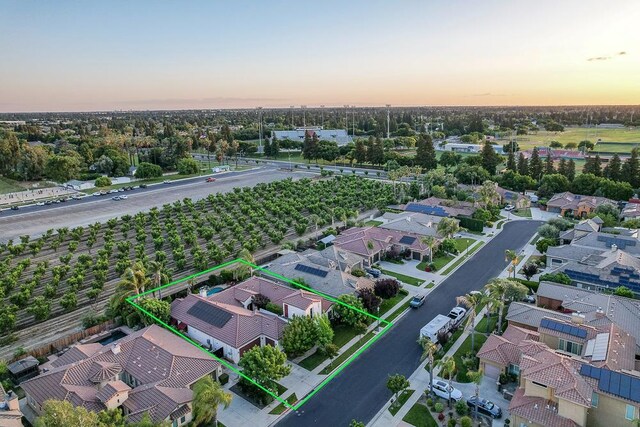 172 Omaha Ave, Clovis, CA 93619 - aerial perspective of suburban area featuring property parcel outlined