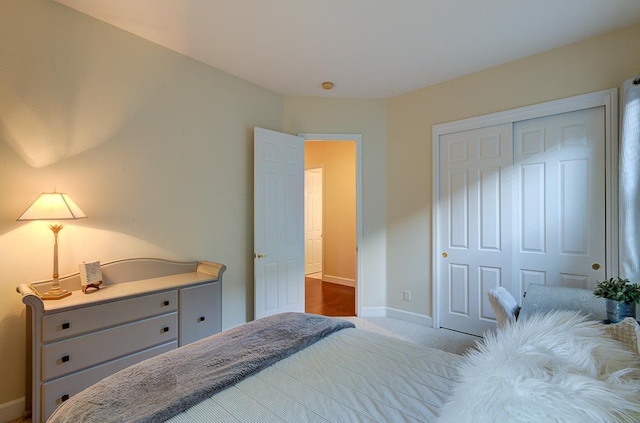 172 Omaha Ave, Clovis, CA 93619 - carpeted bedroom with baseboards and a closet