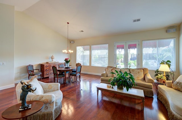 172 Omaha Ave, Clovis, CA 93619 - living area featuring a chandelier, wood finished floors, baseboards, and vaulted ceiling