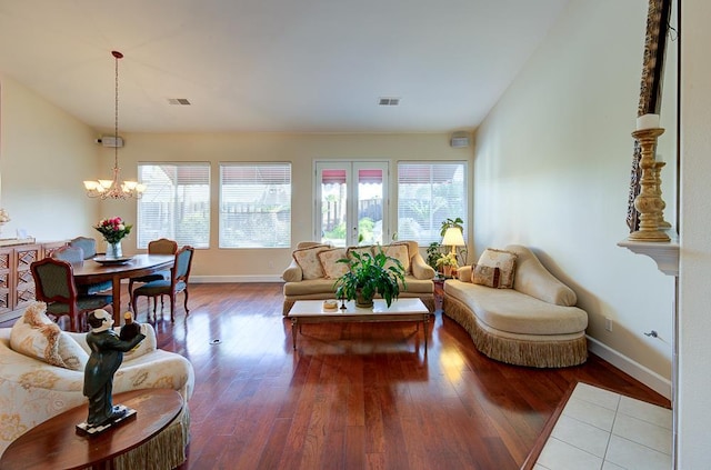 172 Omaha Ave, Clovis, CA 93619 - living room featuring plenty of natural light, a chandelier, baseboards, and lofted ceiling