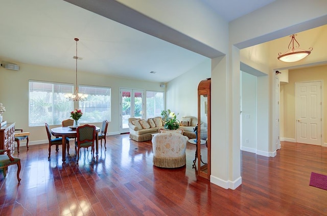 172 Omaha Ave, Clovis, CA 93619 - dining room featuring dark wood-style flooring, baseboards, and a chandelier