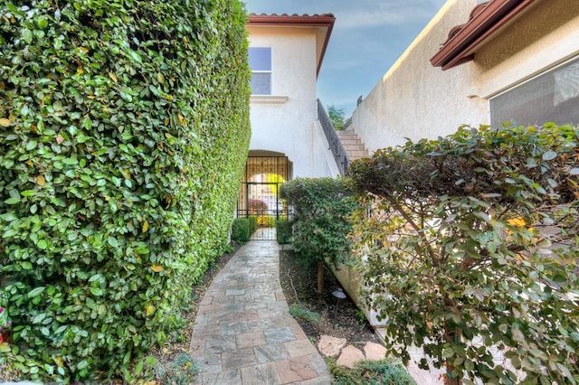 172 Omaha Ave, Clovis, CA 93619 - view of side of property featuring stucco siding and a gate