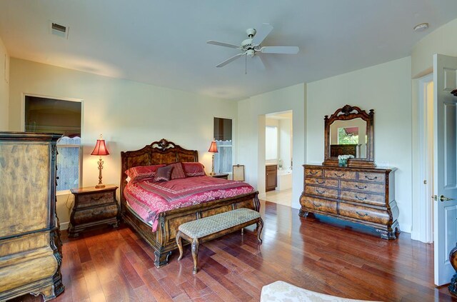172 Omaha Ave, Clovis, CA 93619 - bedroom with wood finished floors, connected bathroom, a ceiling fan, and baseboards