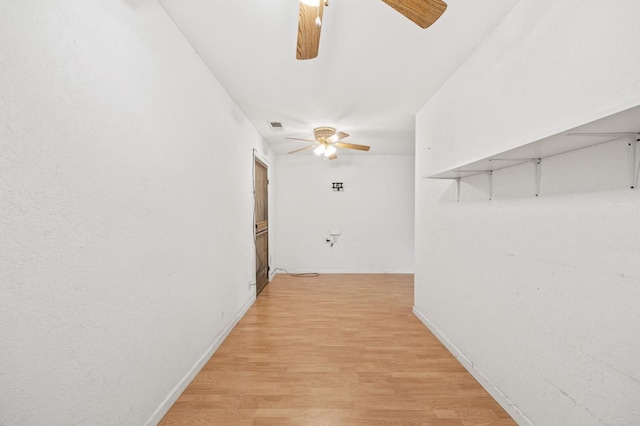 4462 N Manila Ave, Fresno, CA 93727 - hall featuring light wood finished floors and baseboards