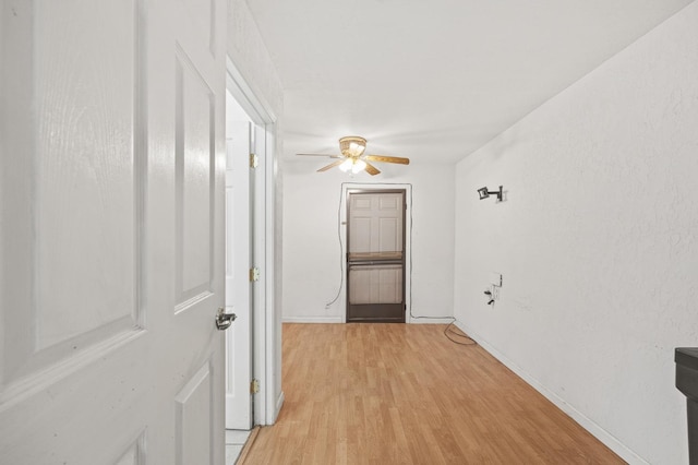4462 N Manila Ave, Fresno, CA 93727 - hallway with light wood finished floors and baseboards