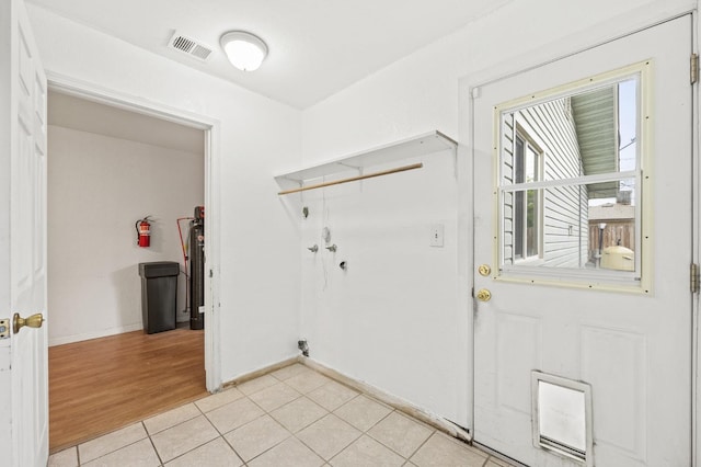 4462 N Manila Ave, Fresno, CA 93727 - entrance foyer featuring baseboards and light tile patterned floors