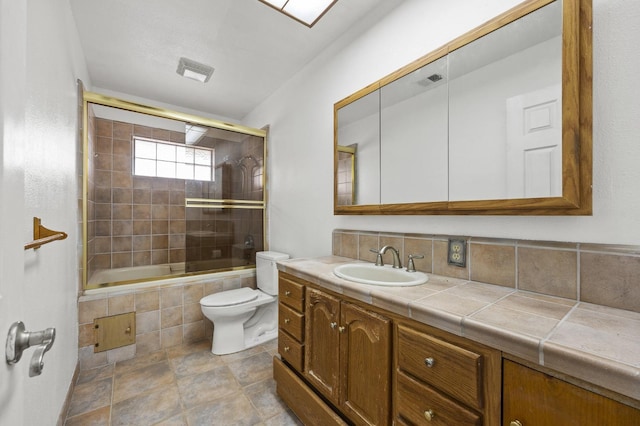4462 N Manila Ave, Fresno, CA 93727 - full bathroom with tiled shower / bath, vanity, and stone finish flooring