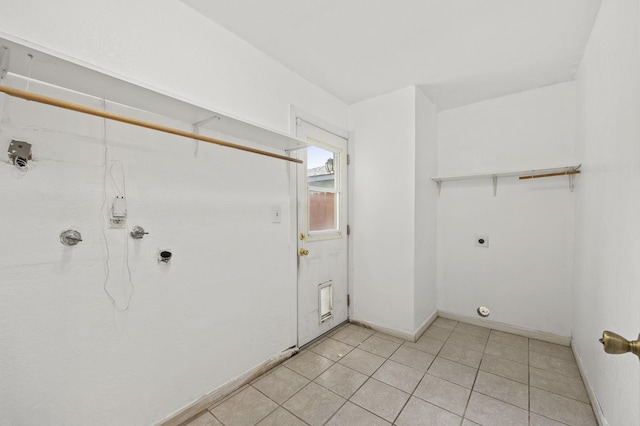 4462 N Manila Ave, Fresno, CA 93727 - laundry room with hookup for a gas dryer, hookup for an electric dryer, and light tile patterned flooring