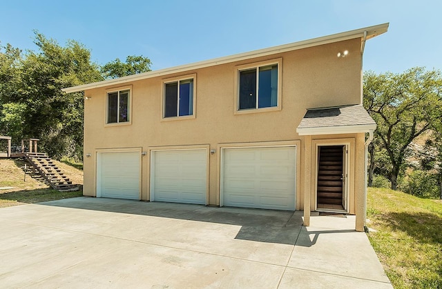 garage with driveway