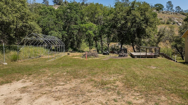view of yard with a wooden deck