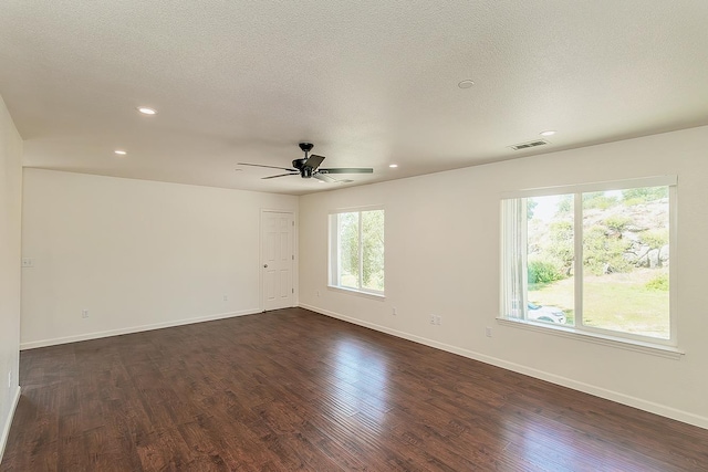 empty room with recessed lighting, ceiling fan, visible vents, and baseboards