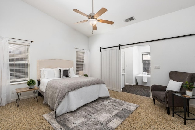 4650 W Chennault Ave, Fresno, CA 93722 - bedroom featuring a barn door, vaulted ceiling, baseboards, and a ceiling fan