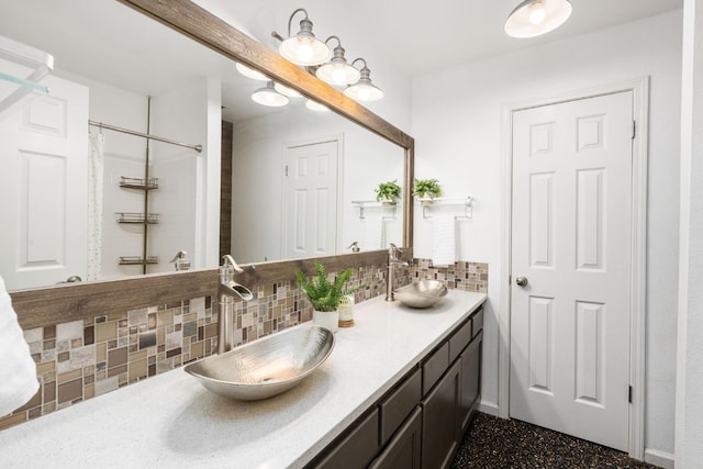 4650 W Chennault Ave, Fresno, CA 93722 - full bath featuring tasteful backsplash, double vanity, and a shower with shower curtain