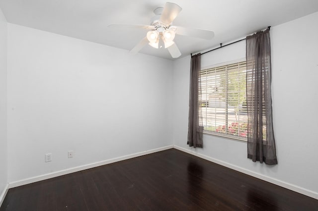 4650 W Chennault Ave, Fresno, CA 93722 - unfurnished room with baseboards, dark wood-style flooring, and a ceiling fan