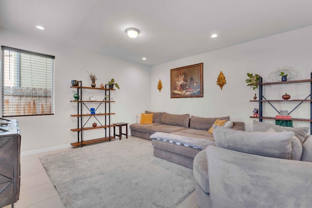living area with recessed lighting, baseboards, and tile patterned floors