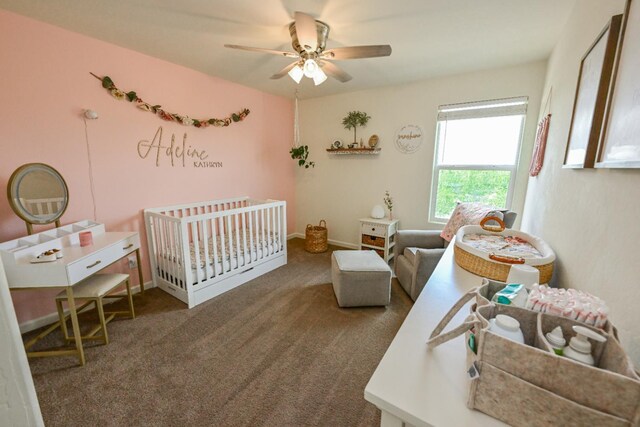 1845 George Ave, Sanger, CA 93657 - carpeted bedroom featuring a crib and ceiling fan