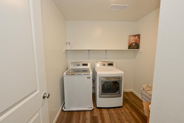 1845 George Ave, Sanger, CA 93657 - washroom featuring wood finished floors, washer and dryer, and baseboards