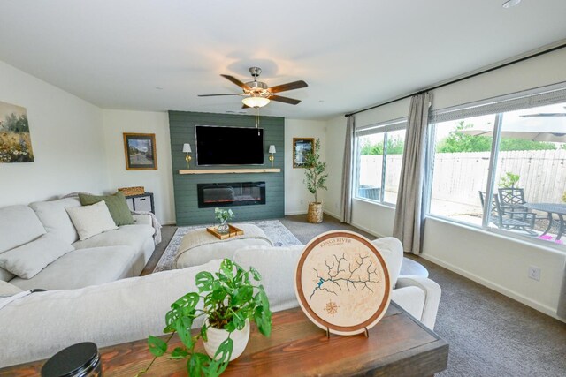 1845 George Ave, Sanger, CA 93657 - carpeted living room featuring baseboards, a large fireplace, and ceiling fan