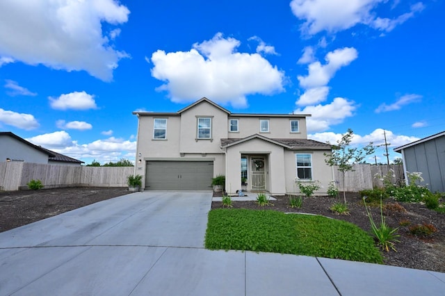 1845 George Ave, Sanger, CA 93657 - traditional-style home featuring stucco siding, fence, concrete driveway, and a garage