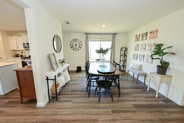 1845 George Ave, Sanger, CA 93657 - dining area featuring dark wood finished floors, baseboards, and recessed lighting