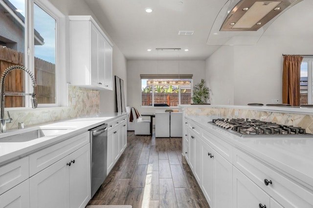 855 Groveland Ave W, Madera, CA 93636 - kitchen featuring dark wood-style floors, recessed lighting, light countertops, a sink, and stainless steel appliances
