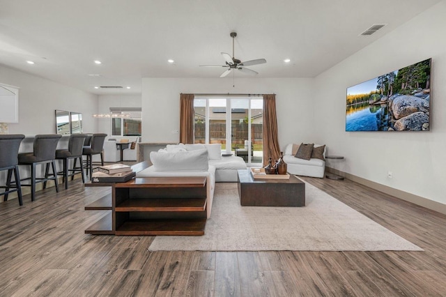 855 Groveland Ave W, Madera, CA 93636 - living room featuring plenty of natural light, wood finished floors, and visible vents