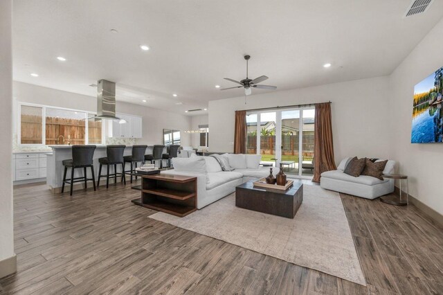 855 Groveland Ave W, Madera, CA 93636 - living area featuring recessed lighting, a ceiling fan, wood finished floors, and visible vents