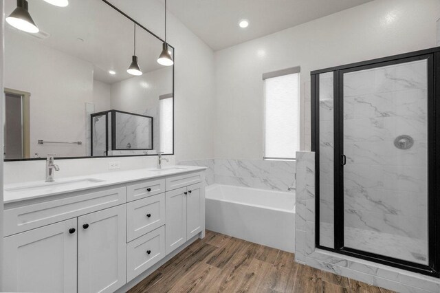 855 Groveland Ave W, Madera, CA 93636 - full bath featuring a sink, a garden tub, a stall shower, and double vanity