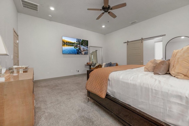 855 Groveland Ave W, Madera, CA 93636 - carpeted bedroom featuring a ceiling fan, recessed lighting, a barn door, and visible vents