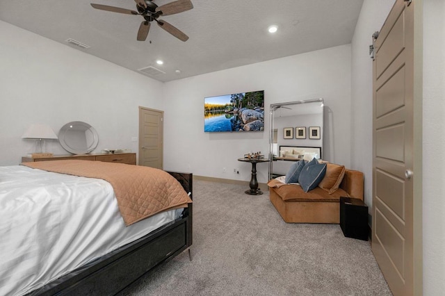 855 Groveland Ave W, Madera, CA 93636 - bedroom with visible vents, recessed lighting, a barn door, light colored carpet, and a ceiling fan