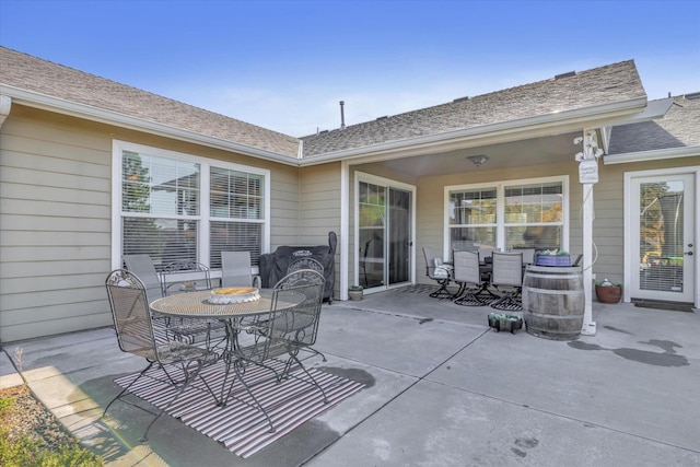 view of patio with outdoor dining area