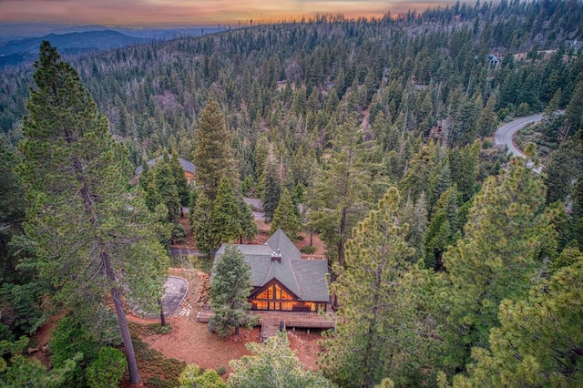 40596 Wild Iris Ln, Shaver Lake, CA 93664 - aerial view at dusk featuring a wooded view and a mountain view