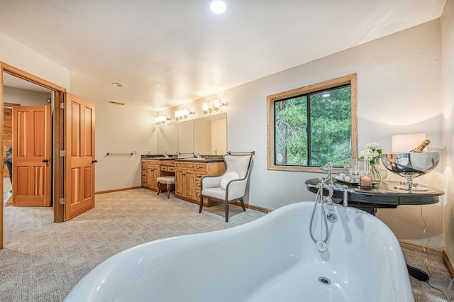 40596 Wild Iris Ln, Shaver Lake, CA 93664 - bathroom featuring baseboards, a freestanding bath, and vanity