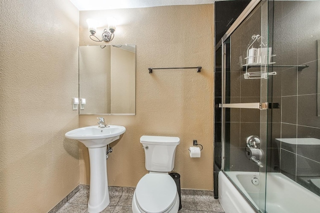 40596 Wild Iris Ln, Shaver Lake, CA 93664 - full bath with shower / bath combination with glass door, a sink, and toilet