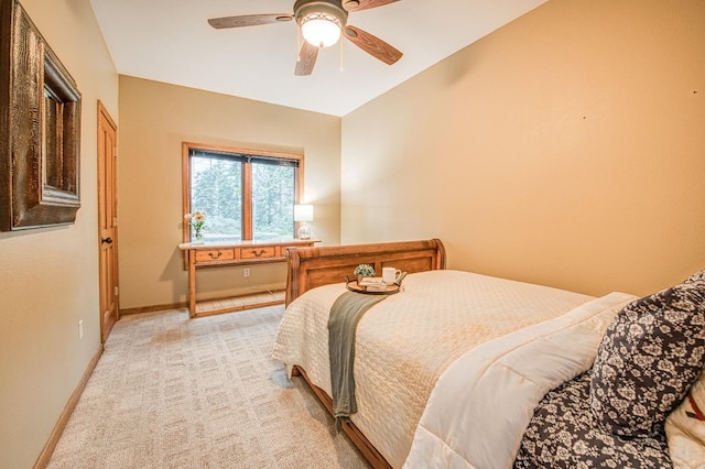 40596 Wild Iris Ln, Shaver Lake, CA 93664 - bedroom with baseboards, a ceiling fan, and light colored carpet