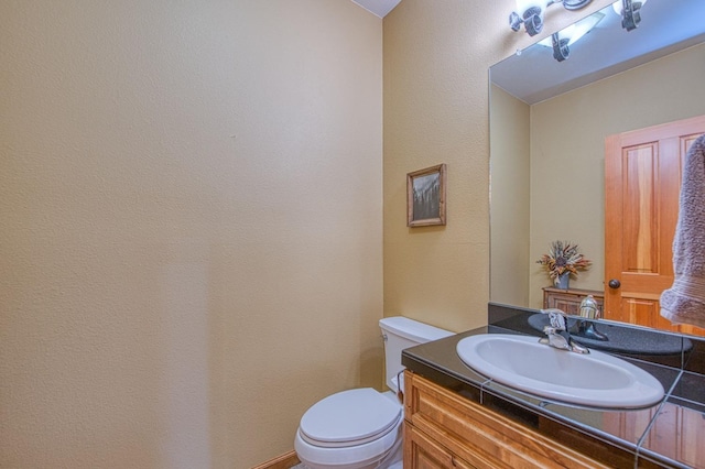 40596 Wild Iris Ln, Shaver Lake, CA 93664 - half bathroom with vanity and toilet