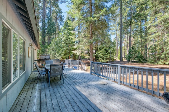 deck featuring outdoor dining space