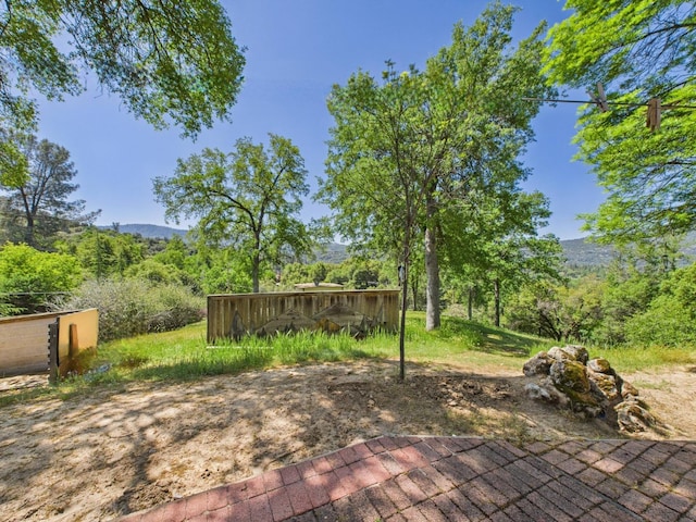 wooden terrace featuring a mountain view