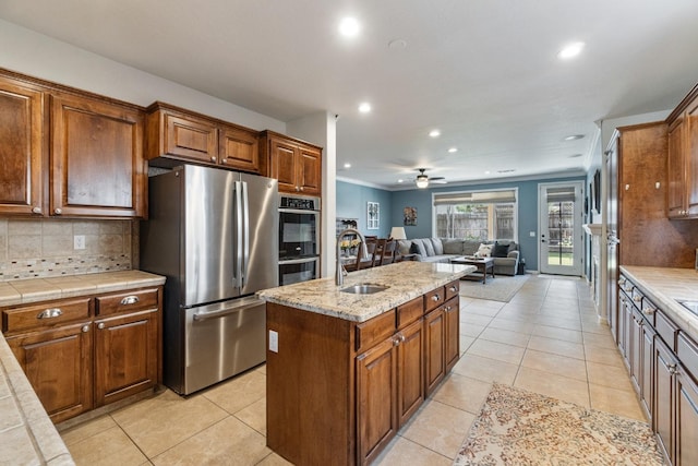 1389 Vineyard Pl, Hanford, CA 93230 - kitchen featuring recessed lighting, a sink, appliances with stainless steel finishes, and tasteful backsplash